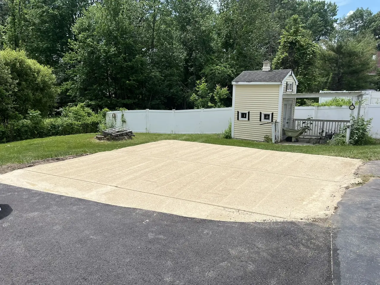 Compacted crushed stone pad prepared for a shed in Southern New Hampshire